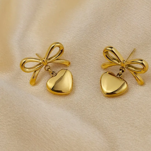 Bow with hanging heart earring